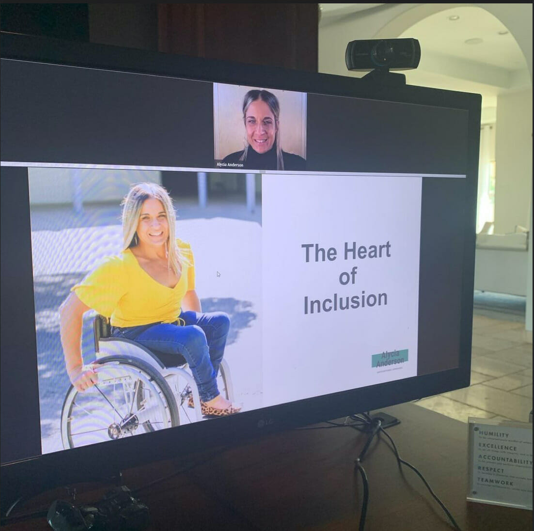 alycia on monitor with slide the heart of inclusion